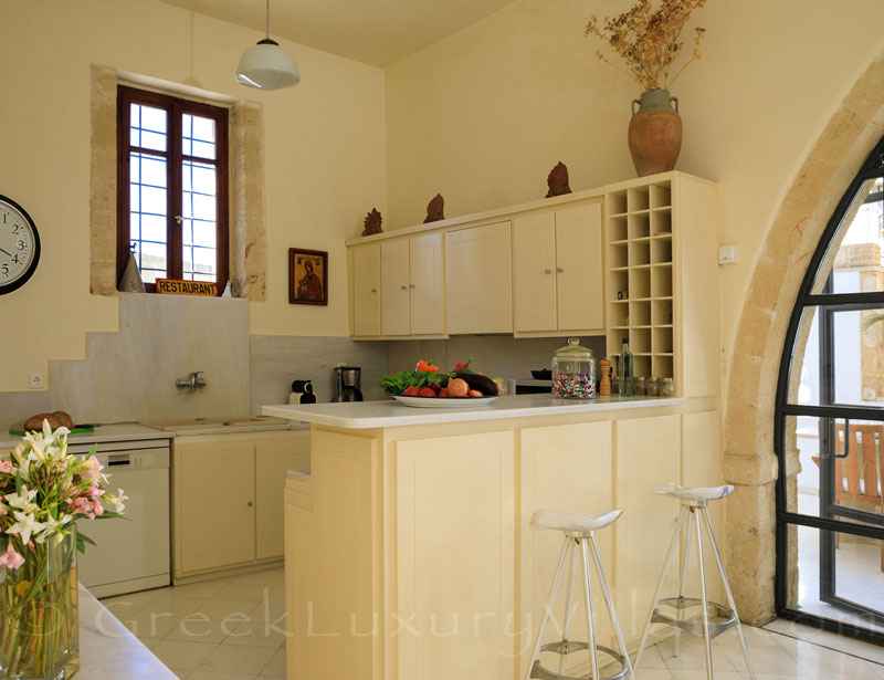 The kitchen of an exclusive historic villa in a traditional village of Crete