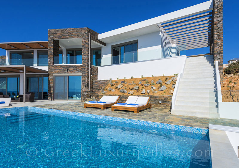 Modern seafront luxury villa with a pool in Crete