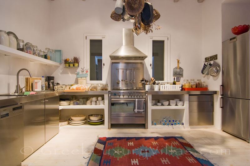 The kitchen in a luxurious villa with a big pool on Kea