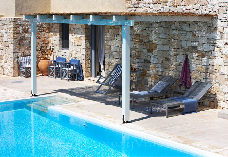 Pool area with seaview at a beachfront villa in Paxos