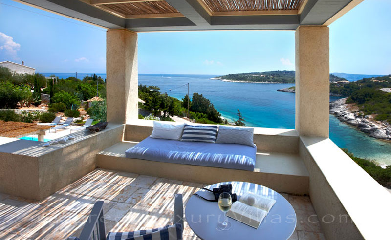 The view of the sea from a beachfront villa with a pool in Paxos