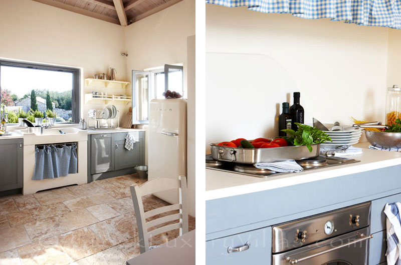 The kitchen of beachfront villa with a pool in Paxos