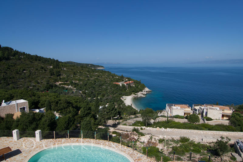 Seaview from the bed of a villa with a pool in Paxos