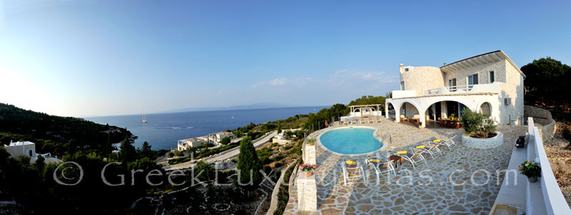 Panoramic sea view of a villa with a pool in Paxos