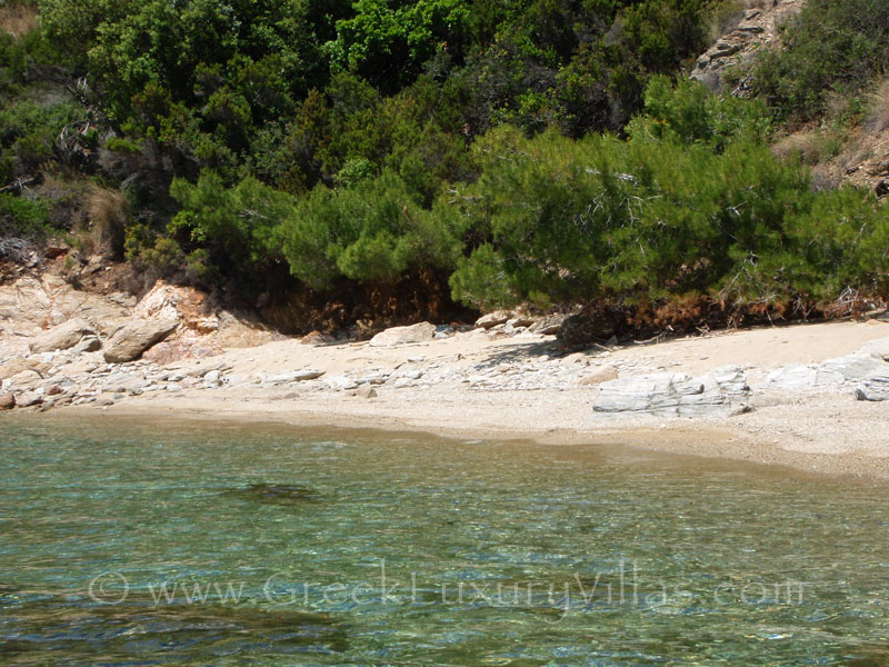 Sandy beach in front of cottage in Skiathos