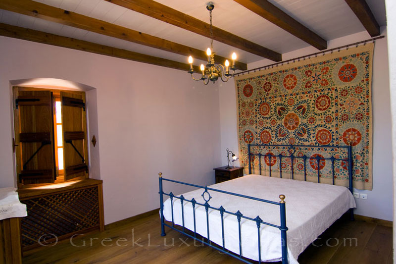Ambelos's bedroom in a traditional villa in Spetses