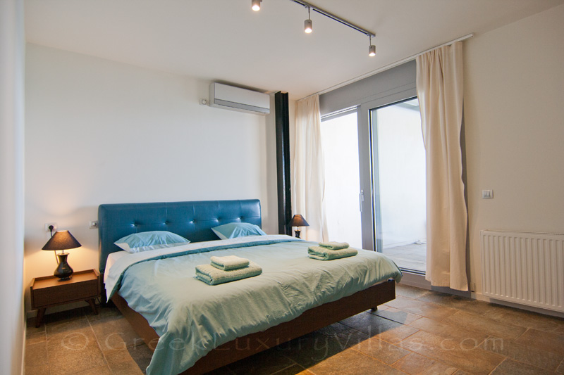 spacious bedroom with sea view beachfront apartment near Athens