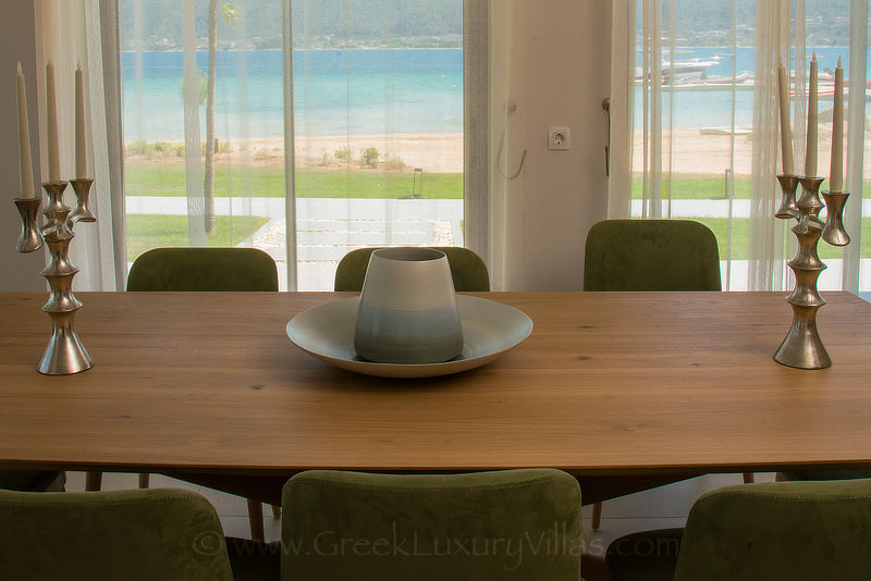 indoor dining at beachfront villa private island