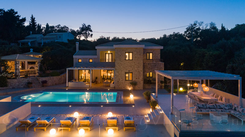 Outdoor lounge of the luxury villa with a pool in Corfu