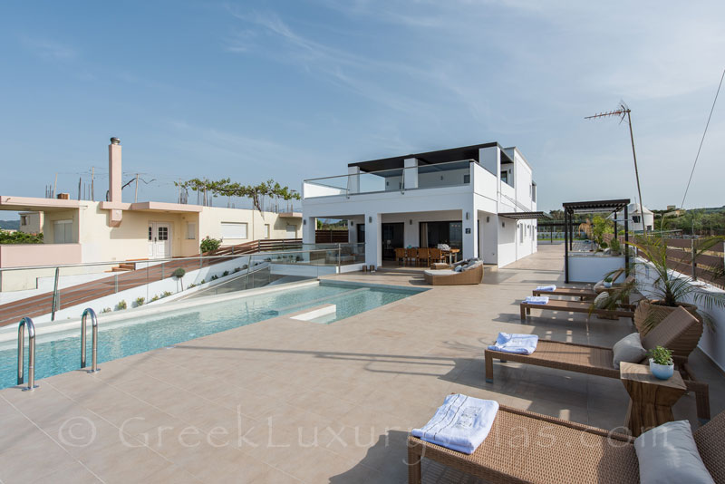 pool area modern villa with private tennis court