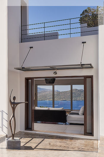 A modern luxury villa with heated pool overlooking Elounda Bay, Crete