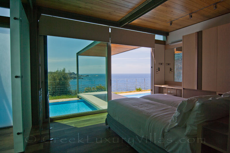 seaview bedroom in modern seafront villa with pool on Crete