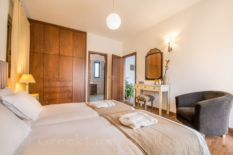 Bedroom of luxury villa with pool in Crete