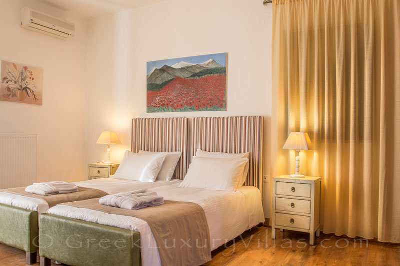 Bedroom of luxury villa with pool in Crete