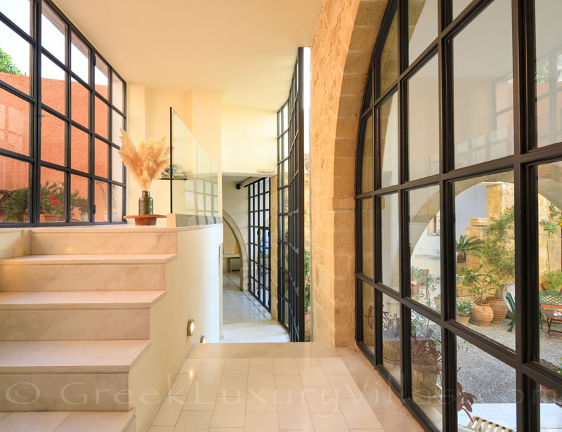 A corridor in an exclusive historic villa in a traditional village of Crete
