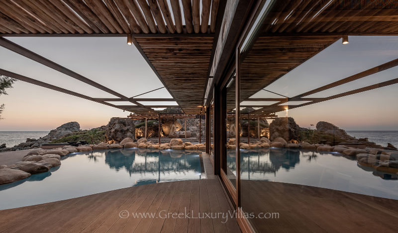 Sunset at the two bedroom beach house with pool in Crete