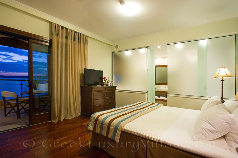 Bedroom sea view of traditional cretan style seafront villa in Almyrida Crete