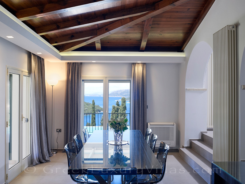 dining room with sea view of luxury villa in Sivota