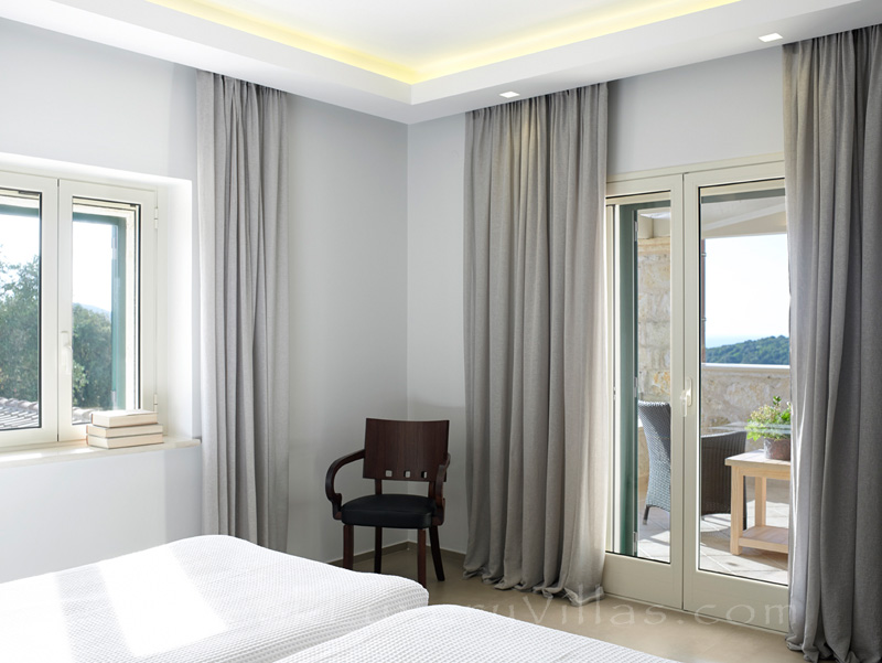 modern bedroom of luxury villa in Sivota