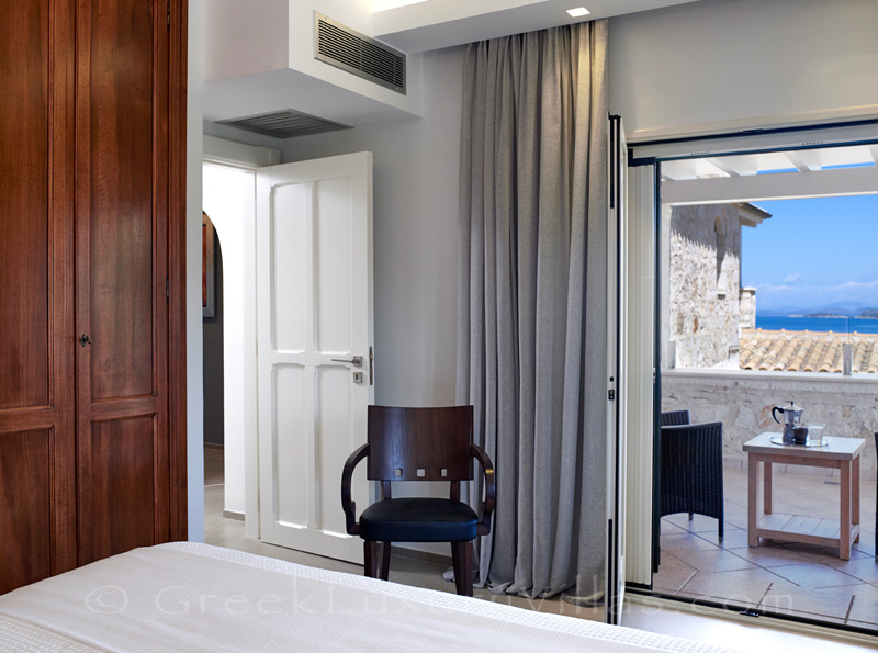 exclusive bedroom of luxury villa in Sivota