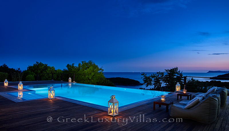 The luxury villa with a heated pool in Sivota at night