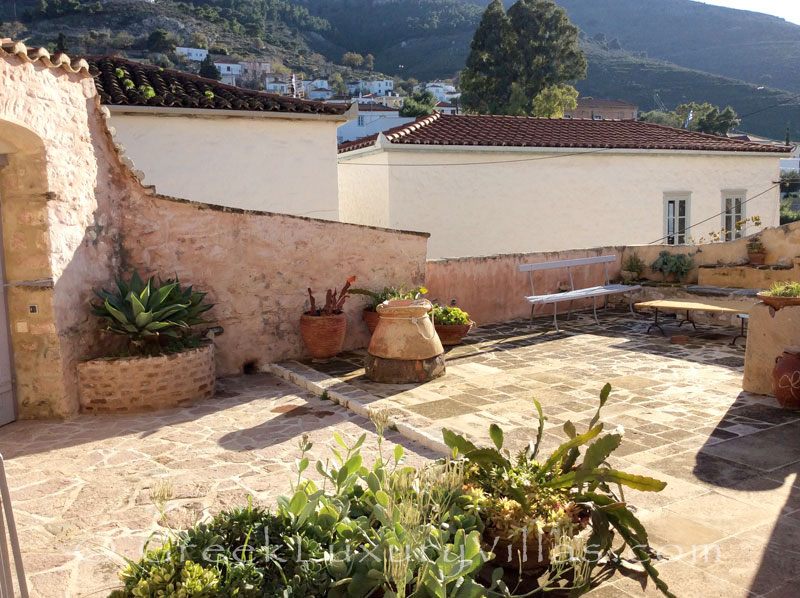 The sunny yard at a romantic traditional house in Hydra