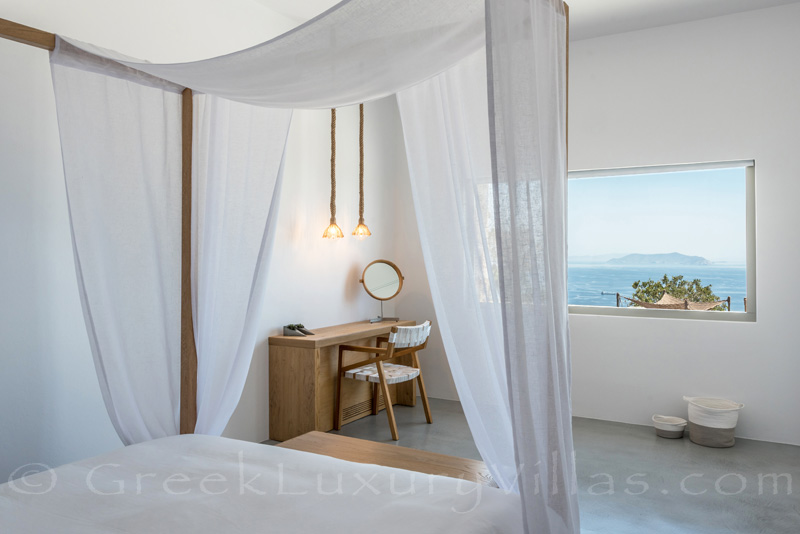Bedroom with sea view of luxury villa with pool in Greece