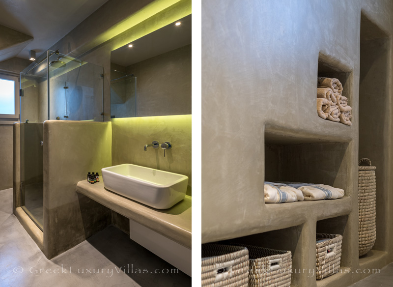 Modern bathroom of luxury villa with pool in Kea