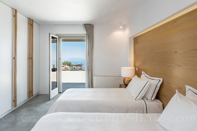 Sea view from bed in luxury villa with pool on Greek island