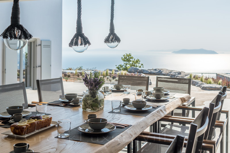 Dining with sea view in luxury villa with pool on Kea