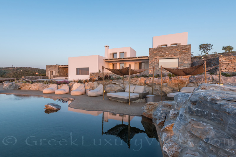 Sunset at luxury villa with pool on Kea Greece