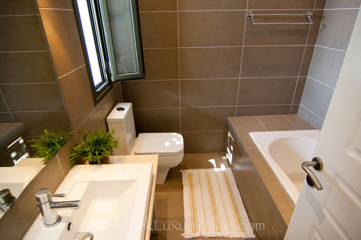 bathroom of villa with pool by the beach