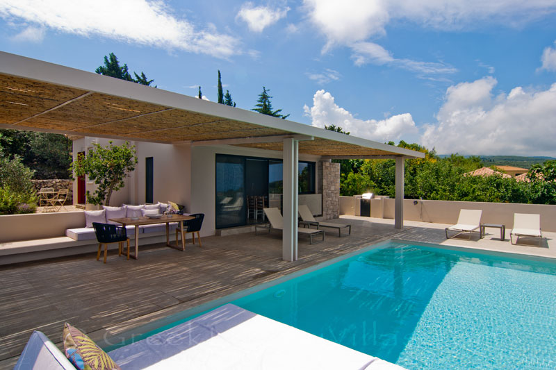 Sunbathing while enjoying the seaview from the pool of the villa in Lefkas