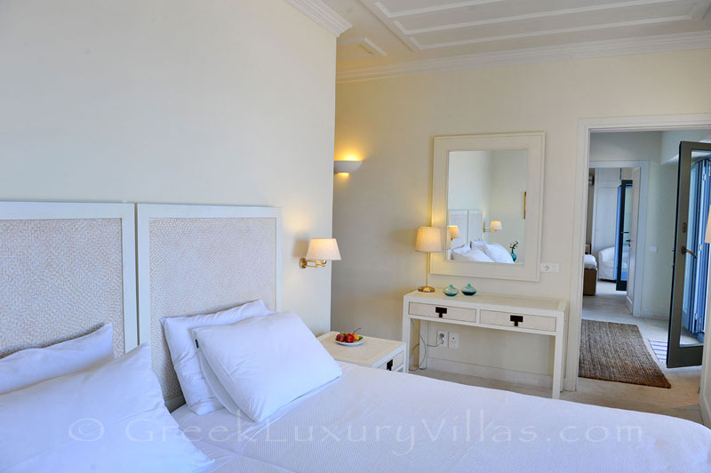 A bedroom in the luxury villa with a pool in Lefkada that sleeps six people