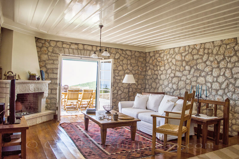 Living-room in traditional villa with pool