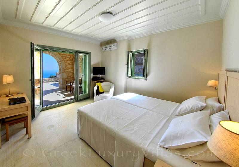 A bedroom with great seaview in a luxury villa with a pool in Lefkas