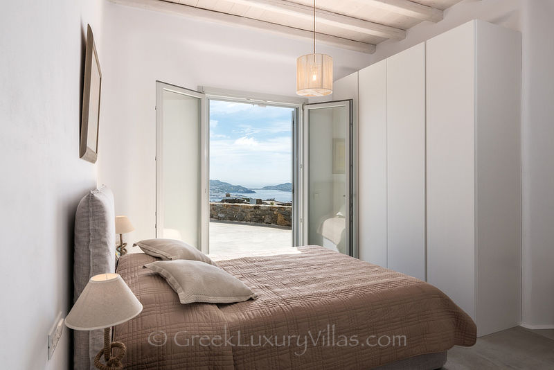 Bedroom of villa with pool at Agios Stefanos Beach