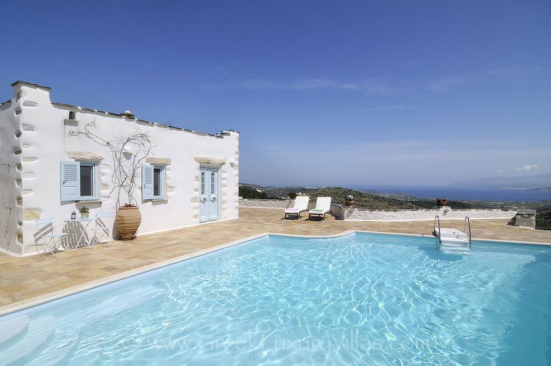 traditional villa with pool and panoramic view