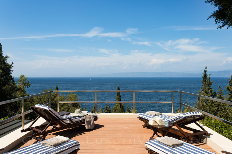 sunbathing with sea view at beachfront villa Paxos