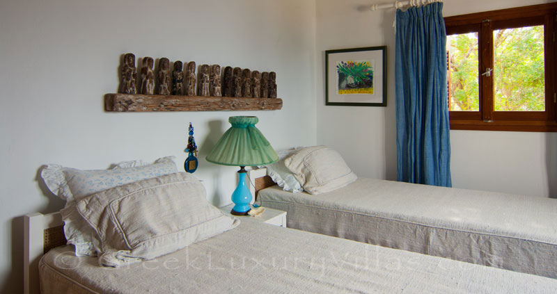 A bedroom with seaview in a beachfront villa in Paxos