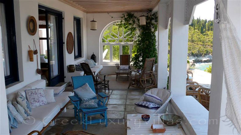 The veranda of a beachfront villa in Paxos