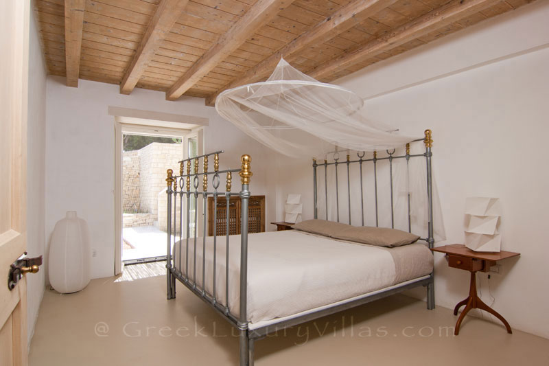 Bedroom of a hiltop estate in Paxos