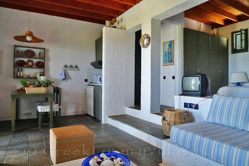 An open plan bedroom in the beach bungalows in Peloponnese