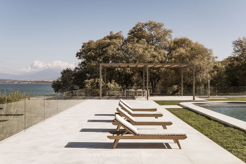 Modern seafront villa with pool