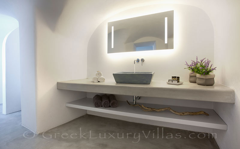 A bathroom in a contemporary luxury villa in Santorini