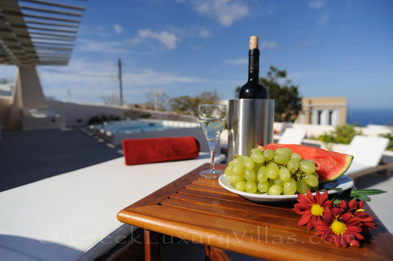 The rooftop terrace with a jacuzzi in a luxury villa in Imerovigli, Santorini