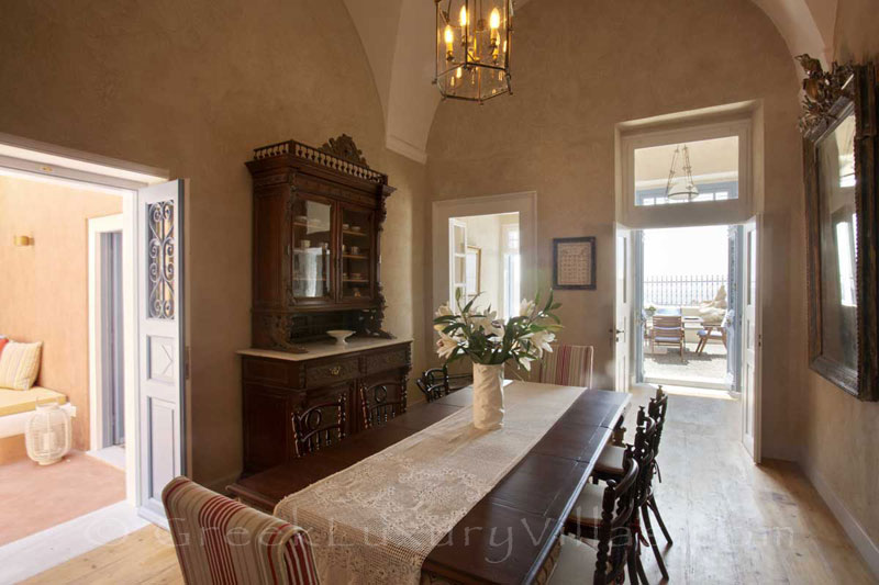 The dining area in an elegant villa in Oia, Santorini
