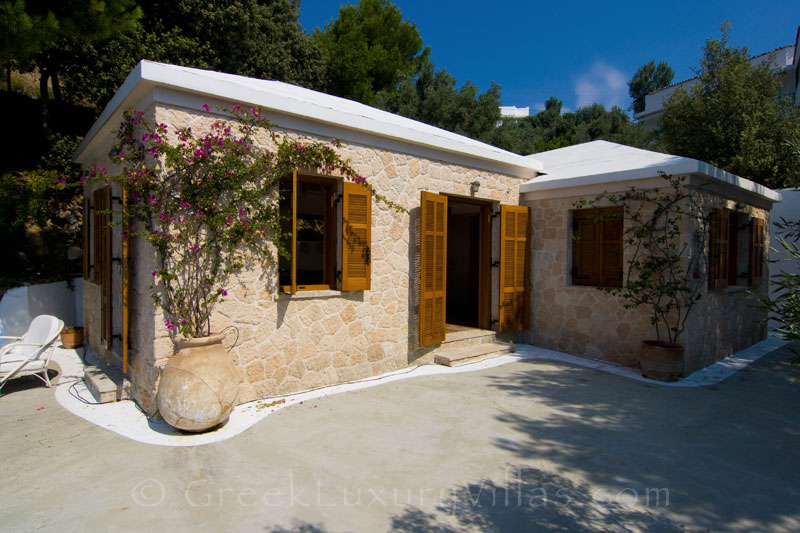 Veranda with privacy of beachfront cottage in Skiathos