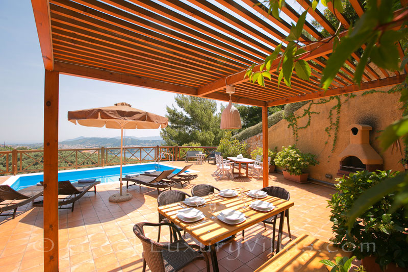 luxurious villa with pool veranda dining table sea view
