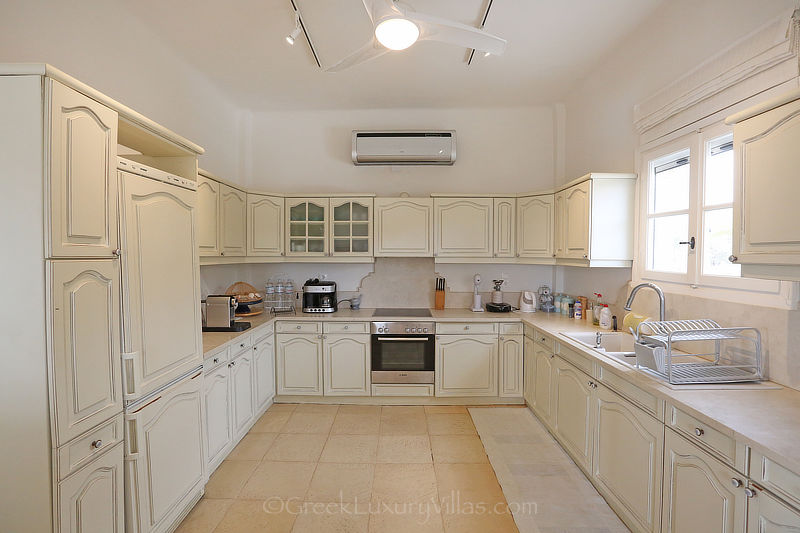 Kitchen of Modern Seafront Luxury Villa with Pool in Syros